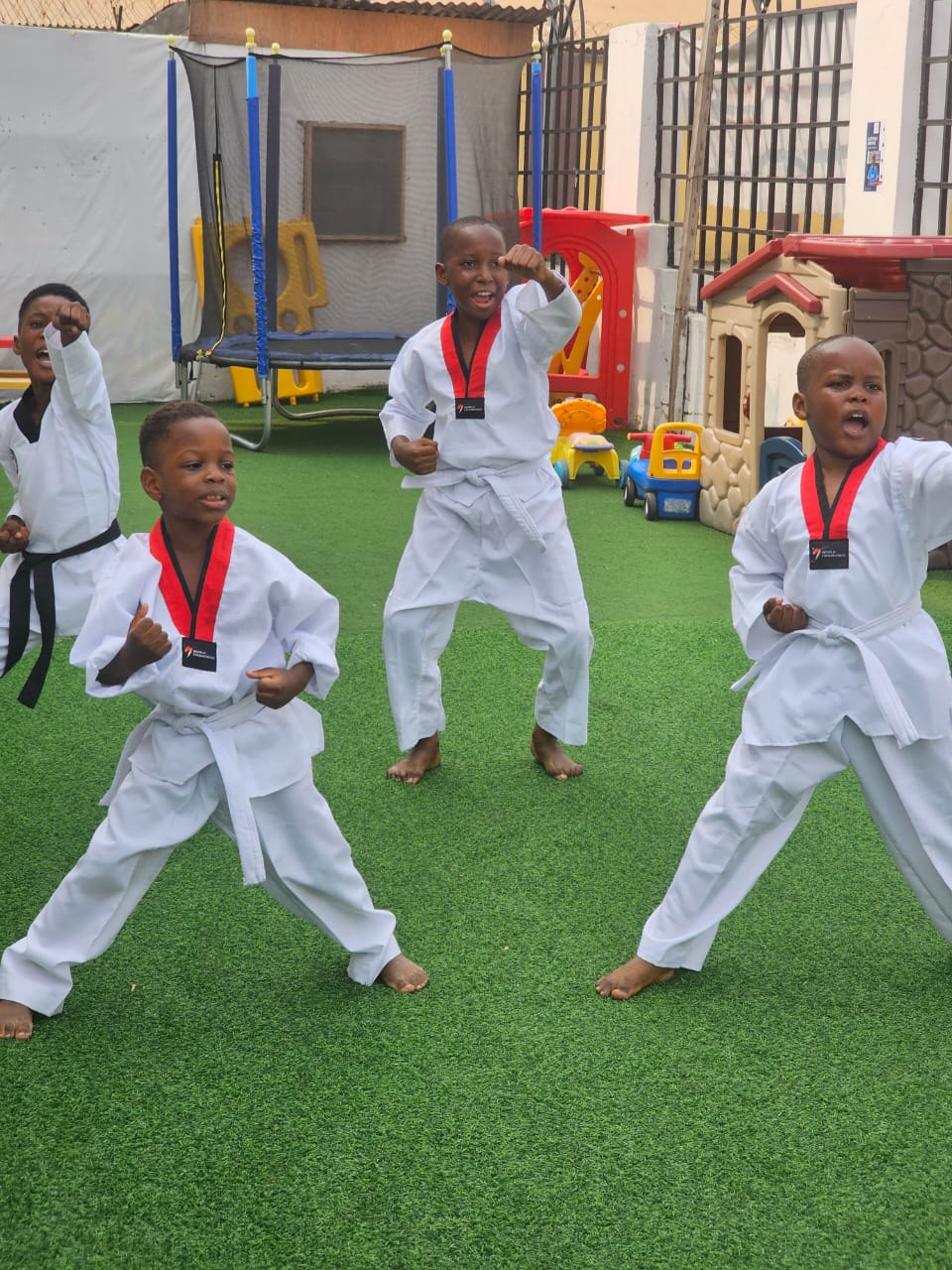 Children learning taekwondo
